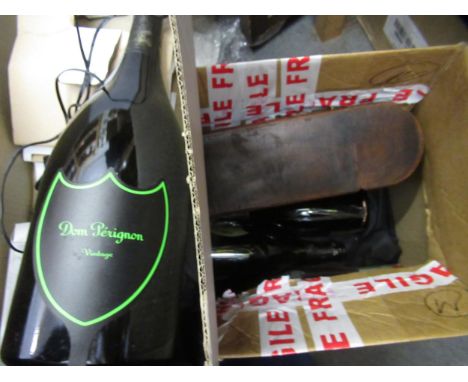 Dom Perignon advertising table lamp in the form of a bottle, together with three empty Champagne bottles, wooden bottle case 