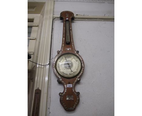 Late Regency mahogany and mother of pearl inlaid banjo shaped wheel barometer / thermometer with silvered dials, 94cm high