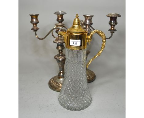 Glass claret jug with plated mounts, together with a pair of three branch plated candelabra and various candelabra mounts