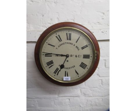 19th Century circular mahogany station clock, the circular 30cm enamel dial with Roman numerals inscribed ' T. Armstrong & Br