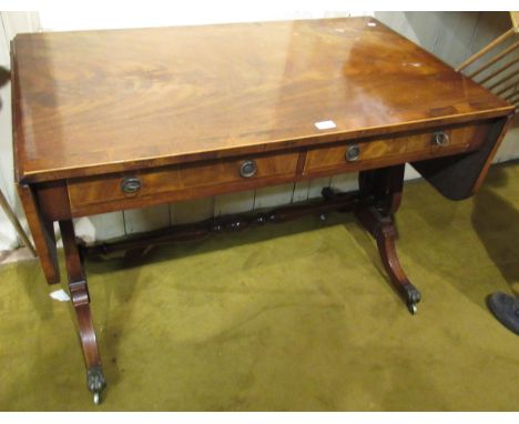 19th Century mahogany and yew wood crossbanded drop-leaf sofa table, with two drawers having circular brass handles and lyre 