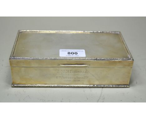 Birmingham silver rectangular cigarette box with hinged engine turned cover, 18cm wide
