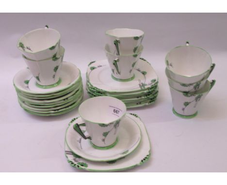 Alfred Pearce Art Deco eight place tea service of geometric and floral design