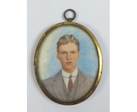A George V oval portrait miniature of Spencer Lort Mansel Mansel-Carey, half length, watercolour, unsigned with gilt metal fr