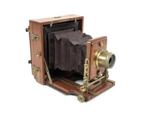 A Victorian J. Lancaster &amp; Sons Instantograph patent field camera, mahogany cased, with leather bellows and brass fitting