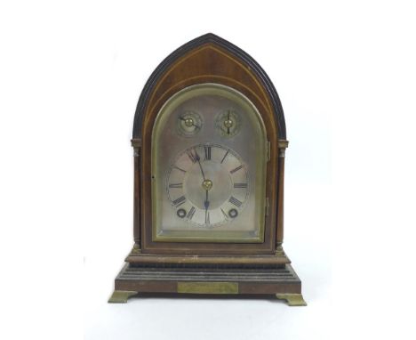 An Edwardian mahogany &amp; inlaid mantel clock, of lancet form, the silvered dial with black Roman numerals, subsidiary chim