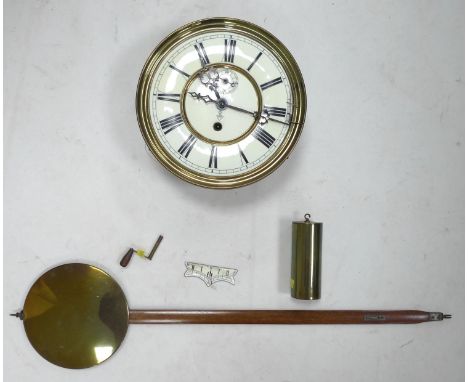 A German wall bracket clock by Gustav Becker, circa 1890, with cream dial and black Roman numerals, subsidiary seconds dial, 