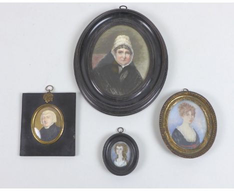 A group of four oval portrait miniatures, believed to be ancestors from the Mansel-Carey family of Uppingham, comprising a po