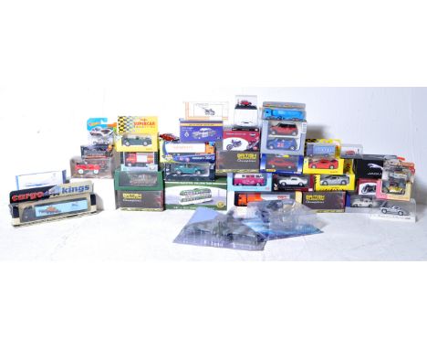 A large collection of assorted boxed diecast model cars, trucks and lorries of various scales and makers to include; Atlas Ed