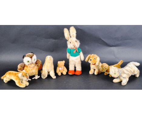A collection of x8 original vintage German Steiff made soft toy teddy bears animals to include; a Rabbit, Owl, Lion, Seal, Ca