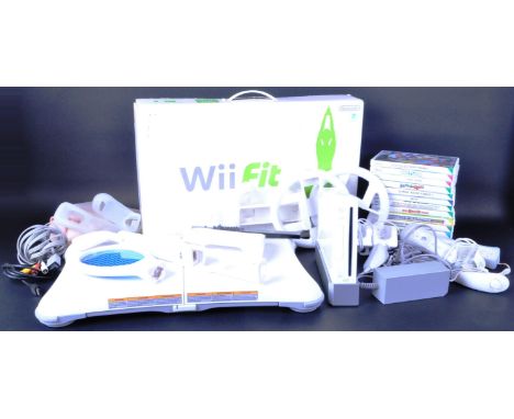 An original Nintendo Wii video games console with controllers and accessories. The collection to include the Wiimote, Nunchuc