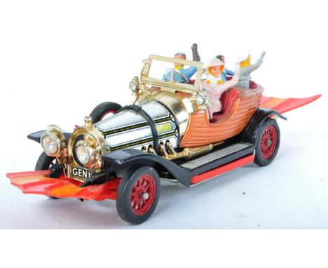 An original vintage Corgi Toys diecast model No. 266 Chitty Chitty Bang Bang car. The car having brown and red body work with