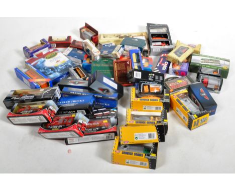 A large collection of assorted diecast model cars trucks and lorries of various scales and makers to include; Lledo Days Gone