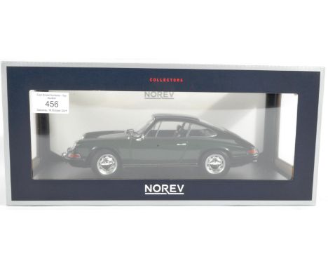 An original ' Norev ' made 1/8 scale boxed diecast model No. 187640 Porsche 911 L. A 1968 example in green colourway. Highly 