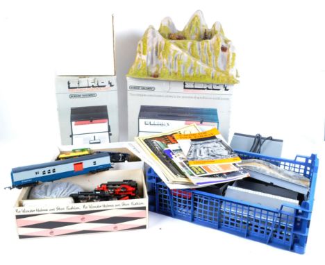 A large collection of assorted 00 gauge model railway trainset locomotive engines, rolling stock wagons, control units and tr