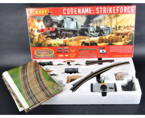 An original Hornby 00 gauge model railway trainset locomotive engine set No. R1147 Codename Strike Force. The set containing&