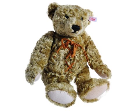 A Limited Edition German Steiff soft toy teddy bear 667299 ' Hot Water Bottle Bear '. The bear having golden mohair and a rem