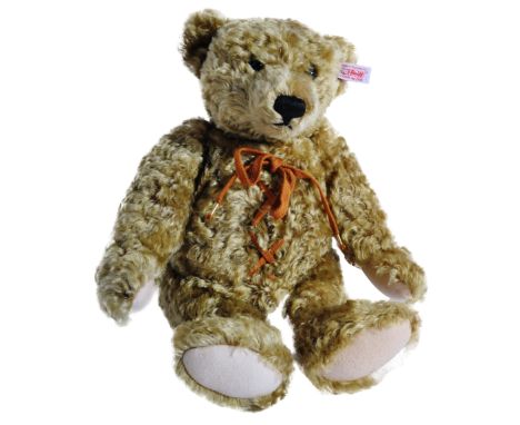 A Limited Edition German Steiff soft toy teddy bear 667299 ' Hot Water Bottle Bear '. The bear having golden mohair and a rem