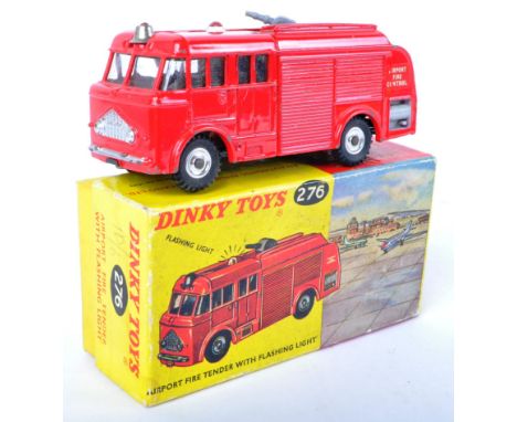 An original vintage Dinky Toys diecast model No. 276 Airport Fire Tender with Flashing Light and original instruction sheet. 