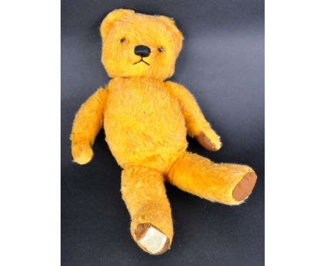 An original vintage Chad Valley made English soft toy teddy bear. Golden yellow short mohair with beaded eyes and stitch blac