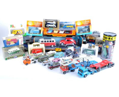 A large collection of assorted diecast model cars, trucks and lorries of various scales and makers to include vintage Dinky a