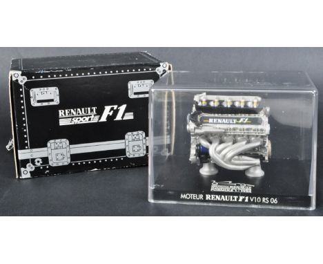 A boxed Renault Williams F1 Formula 1 diecast scale model of a V10 RS 06 engine. The model appearing mint within perspex disp