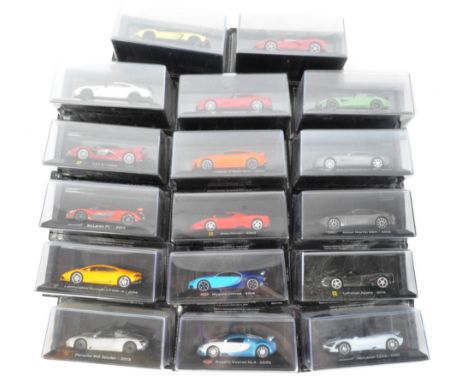 A collection of x17 assorted ' Panini Collections ' 1/43 scale diecast model sports cars and accompanying reference magazines