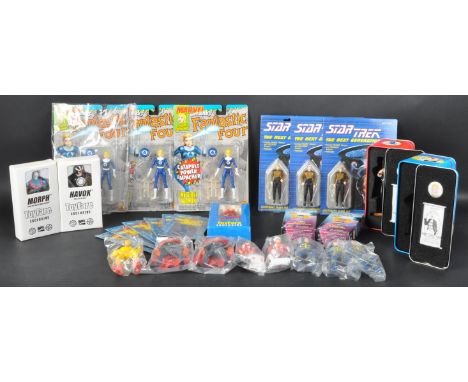 A large collection of assorted boxed and carded vintage playset action figures to include; Galoob Star Trek The Next Generati