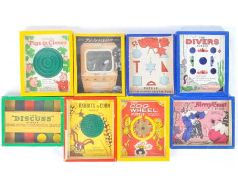A collection of x8 original vintage 1940s / 1950s RJ Series made ' Popular Puzzles ' handheld ball bearing puzzle games. Incl