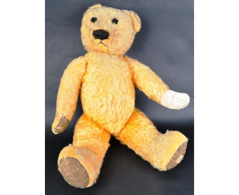 An original vintage Chad Valley made English soft toy teddy bear.&nbsp;Golden short mohair with beaded eyes and stitch black 