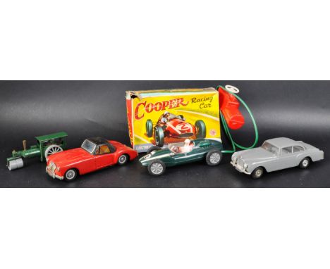 A collection of assorted vintage tinplate / clockwork and friction motor model cars to include; a boxed Empire made battery o