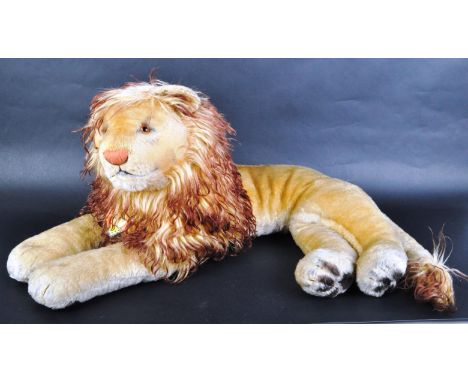 An original vintage German Steiff made soft toy teddy bear ' Leo ' the Lion. Short golden mohair with brown tipped mane, bead