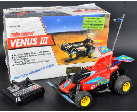 An original vintage Nikko made 1/16 scale boxed RC radio controlled off road buggy ' Venus III '. The model appearing in work