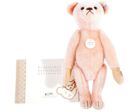 A Limited Edition German Steiff made soft toy teddy bear 408557 1908 Replica bear with growler.&nbsp;A light pink mohair exam