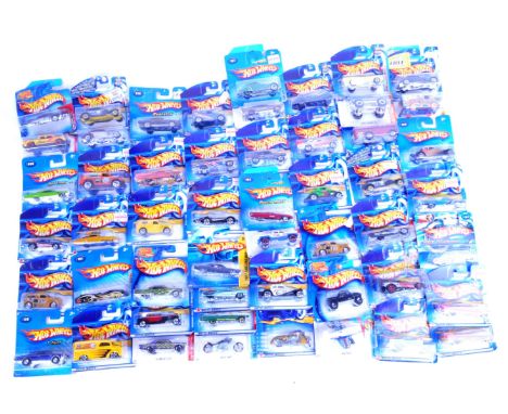 A large collection of approximately x50 carded Mattel made Hot Wheels diecast model cars to include; 140 1959 Cadillac 097 An