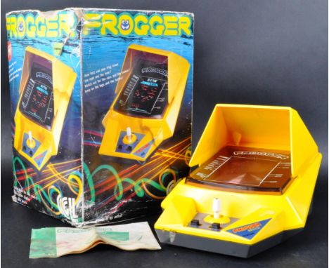 An original vintage 1980's Konami made retro table top&nbsp;electronic computer game / video game ' Frogger '. Retaining orig