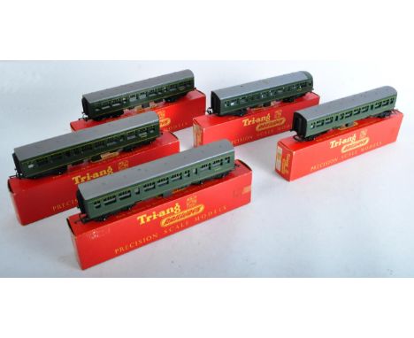 A collection of x5 boxed vintage Triang / Tri-ang 00 gauge model railway trainset locomotive coaches and carriages to include