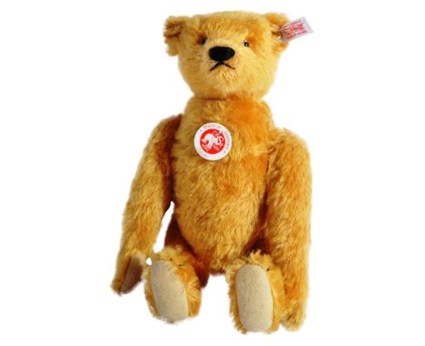 A Limited Edition German Steiff made soft toy teddy bear 037436 ' Somersault Bear '. A golden mohair example with a clockwork