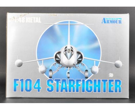 An original Italian ' Armour Collection ' made 1/48 scale diecast model No. 98125 F104 G/S Star Fighter Jet. The model appear