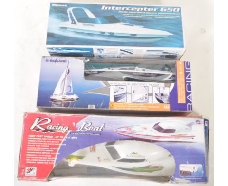 A collection of x3 original vintage radio controlled RC model boats comprising a B-Square Racing Team Sailing Yacht, a Rip Sp