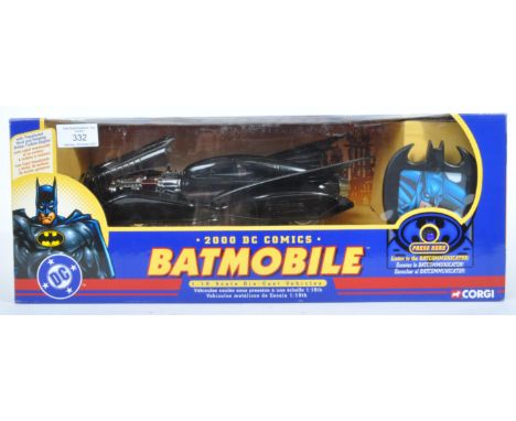 A large Corgi made DC Comics 1/18 scale boxed diecast model No. 77601 Batmobile with Batcommunicator. The Batmobile with remo