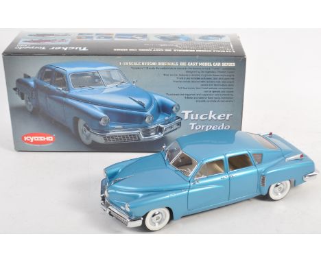 An original Japanese Kyosho made boxed 1/18 scale diecast model No. 08201B ' Tucker Torpedo '. The model appearing mint with 