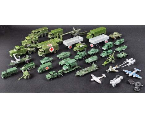 A large collection of assorted vintage Lesney mae Matchbox and Dinky Toys diecast model military vehicles. Examples to includ