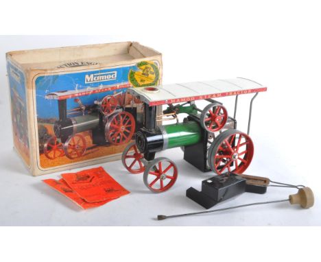 An original vintage Mamod live steam model Steam Tractor TE1A Traction Engine. A green and red model of liquid fuel example w