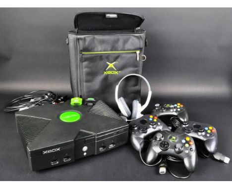 An original Microsoft Xbox video games console with x4 controllers (x2 official first party controllers and x2 third party) p