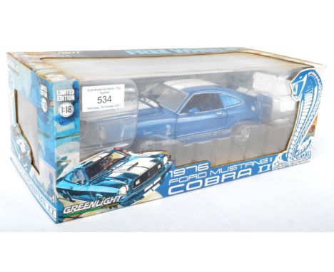 An original Greenlight Collectibles 1/18 scale boxed diecast model No. 12894 Ford Mustang II Cobra. The contents appearing mi