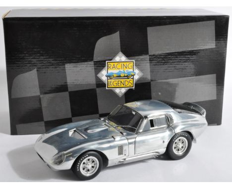 An original Exoto made 1/18 scale boxed diecast ' Racing Legends ' Cobra Daytona Coupe. Highly detailed model within original