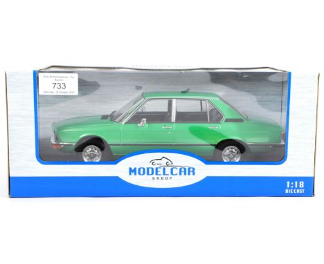 An original boxed ' Model Car Group ' 1/18 scale diecast model No. MCG18119 ' BMW 5 Series E12 '. The model appearing mint, w