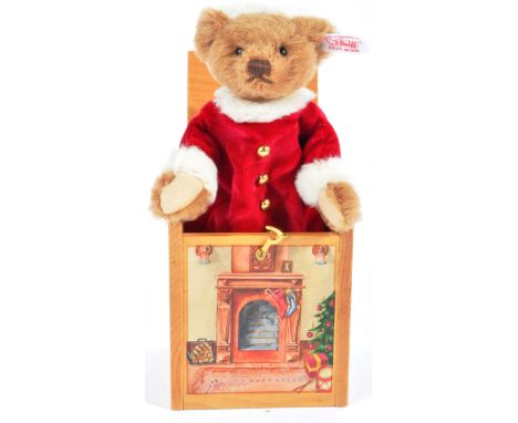 An original German Steiff made Christmas soft toy teddy bear 038419 ' Santa In The Box '. The push down Santa Bear Jack in th