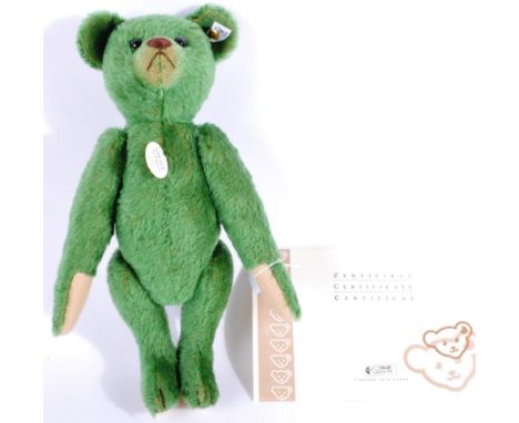 A Limited Edition German Steiff made soft toy teddy bear 408540 1908 Replica bear with growler. A green mohair example with b